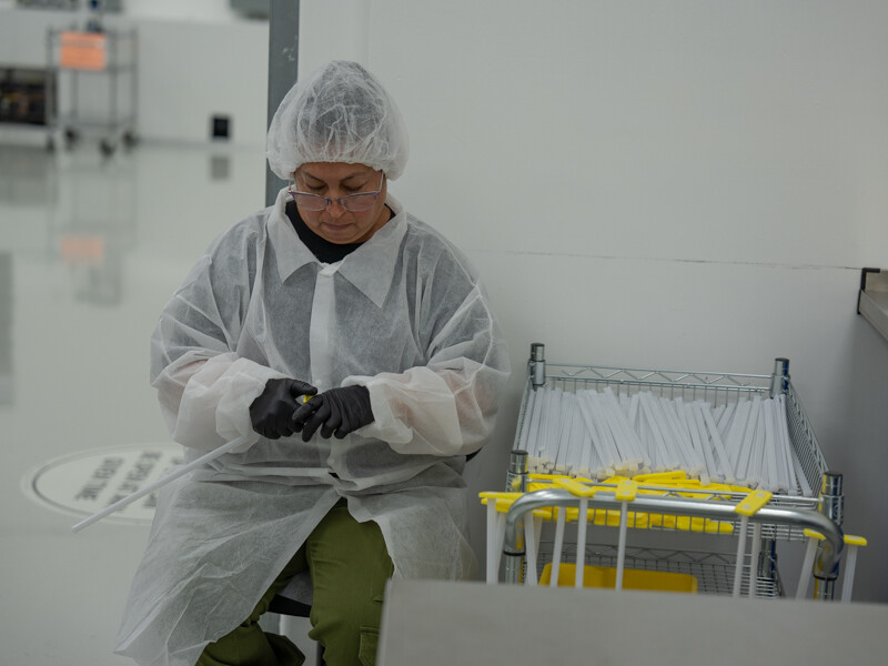 worker assembling plastic part